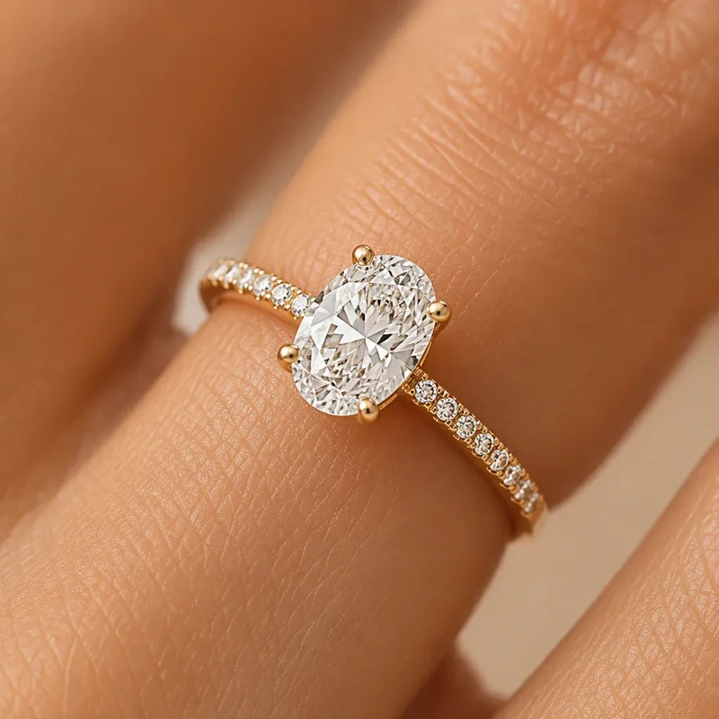 Oval diamond ring on a hand